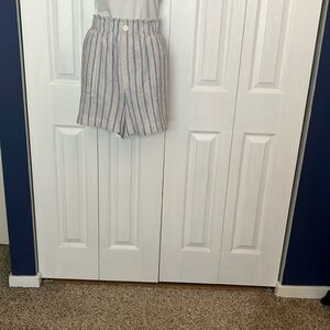 Striped Blue, Red, and White Shorts.